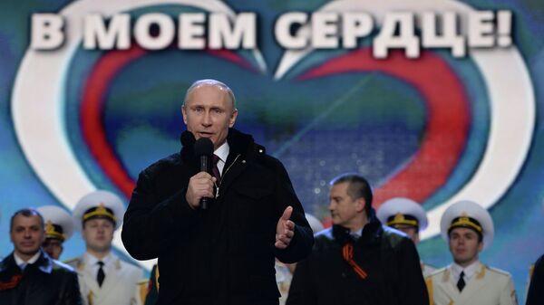 Президент России Владимир Путин во время выступления на митинг-концерте на Красной площади в Москве. 18 марта 2014 