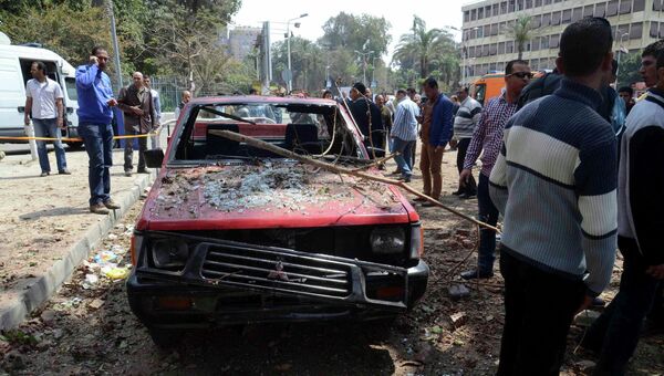 На месте взрыва в центре Каира. 2 апреля 2014