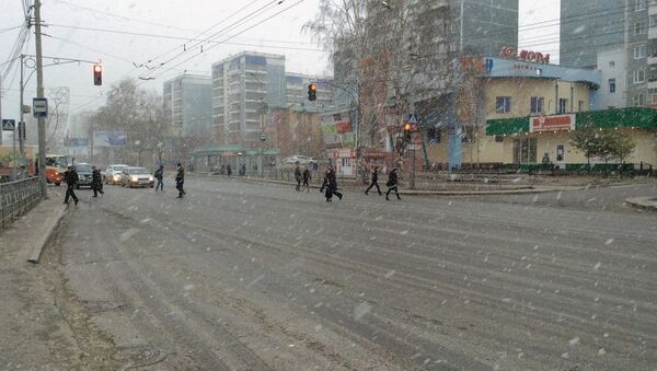 Иркутский тракт в Томске во время весеннего снегопада