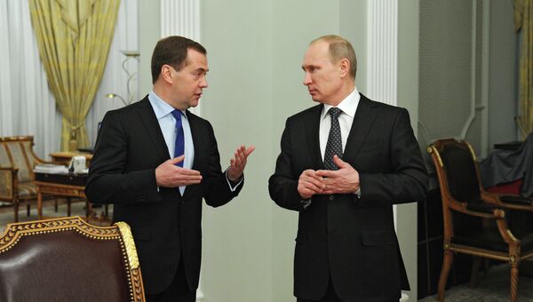 Президент России Владимир Путин и председатель правительства России Дмитрий Медведев