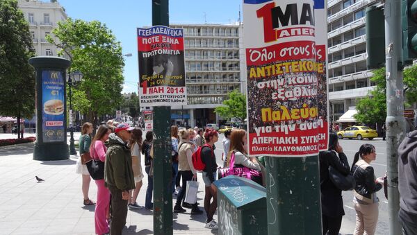 Плакаты в Афинах, посвященные митингам и забастовкам 1 мая