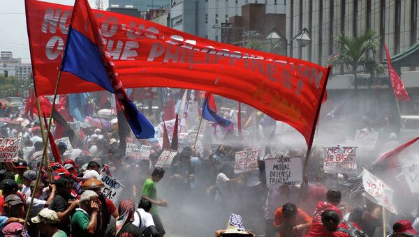 Протест против государственного визита президента США Барака Обамы в Филиппины 29 апреля 2014