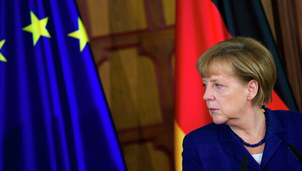 Канцлер Германии Ангела Меркель на встрече с президентом Франции Франсуа Олландом, 10 мая 2014. Архивное фото