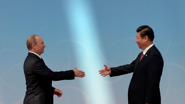 Президент России Владимир Путин и председатель Китайской народной республики Си Цзиньпин. Архивное фото. Президент России Владимир Путин и председатель Китайской народной республики Си Цзиньпин. Архивное фото.