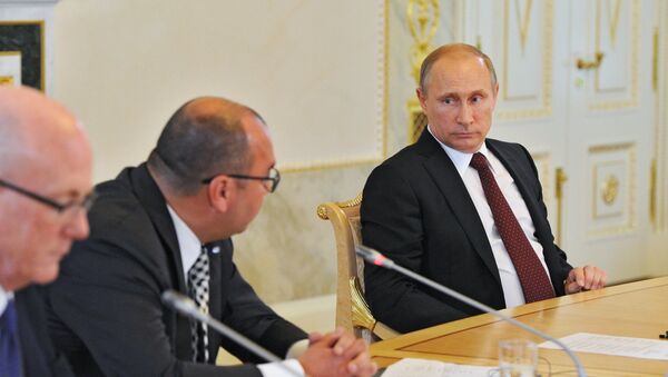 Президент России Владимир Путин на встрече с руководителями ведущих мировых информационных агентств на полях Петербургского международного экономического форума