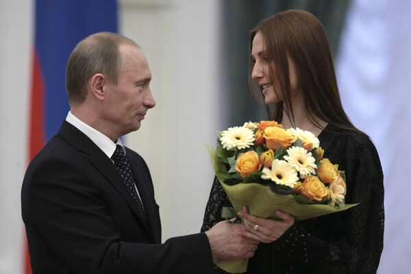Президент России Владимир Путин и балерина Светлана Захарова