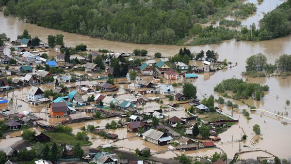 Затопленные частные дома в селе Майма Республики Алтай