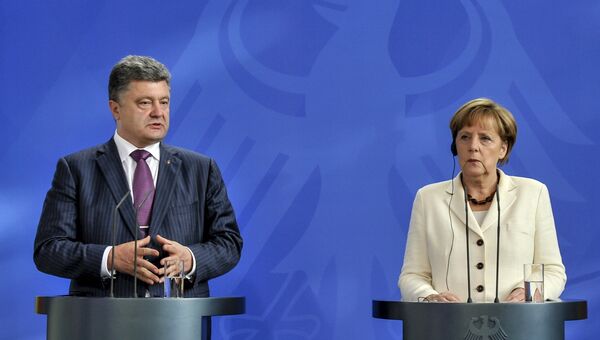Канцлер ФРГ Ангела Меркель и президент Украины Петр Порошенко. Архивное фото
