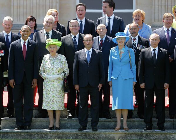 Президент США Барак Обама, британская королева Елизавета II, президент Франции Франсуа Олланд и президент России Владимир Путин в Нормандии