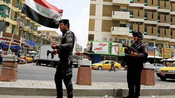 Иракская полиция после захвата боевиками провинции Мосул