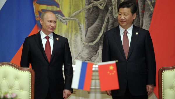 Президент России Владимир Путин и председатель КНР Си Цзиньпин. Архивное фото