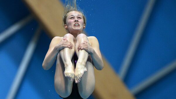 Юлия Тимошинина в соревнованиях по прыжкам в воду. Архивное фото