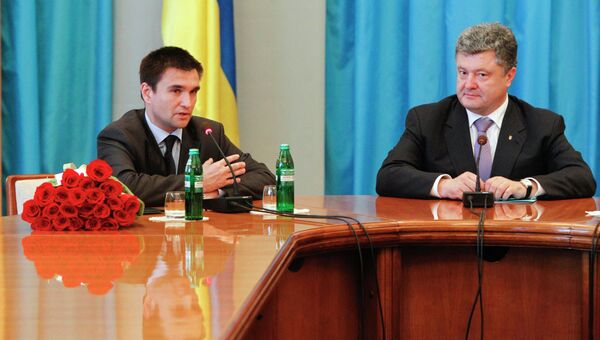 Президент Украины Петр Порошенко и новый глава МИД Украины Павел Климкин. Архивное фото