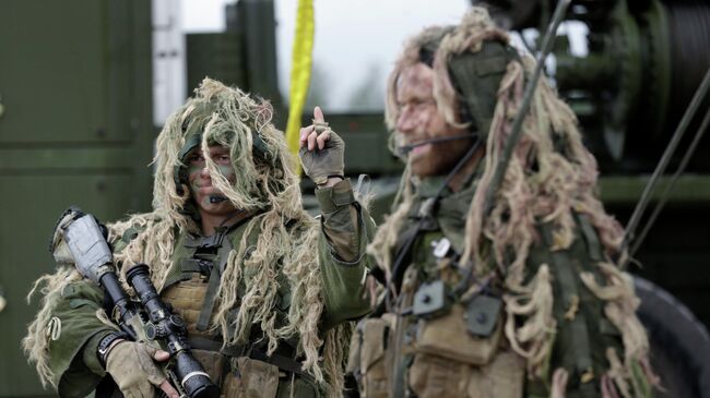 Норвежские солдаты во время военных учений Saber Strike 12 июня 2014 года
