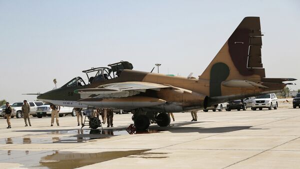 Истребитель Су-25 на военной базе в Багдаде. 1 июля 2014
