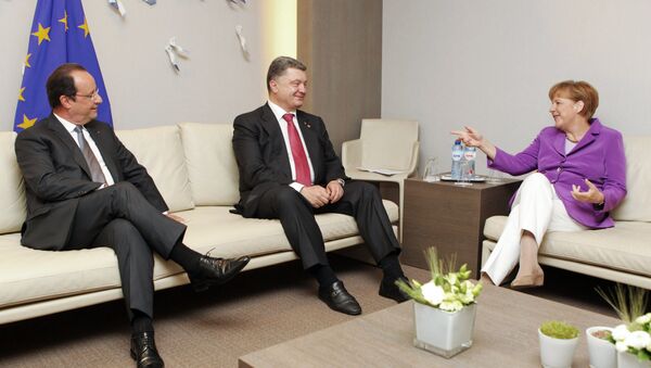 Ангела Меркель, П. Порошенко и Франсуа Олланд в Брюсселе