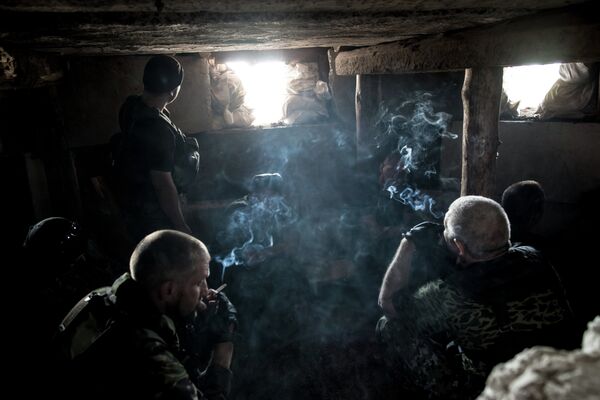 Бойцы батальона народного ополчения Восток во время боя за аэропорт в Донецке