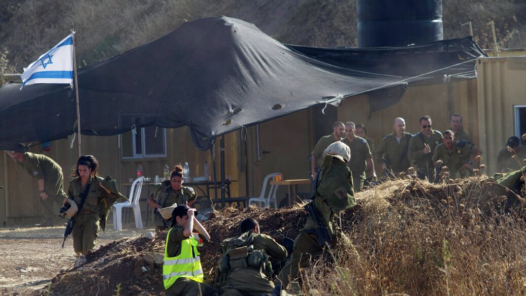 © AP Photo / Dan Balilty<br>Израильские военные в Тель-Авиве. Архивное фото