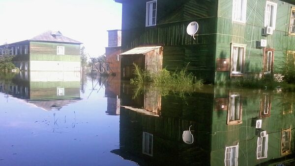 Затопленная улица в поселке Уссурийский. Архивное фото
