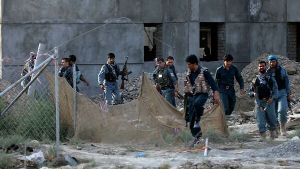 Афганская полиция на месте обстрела аэропорта в Кабуле