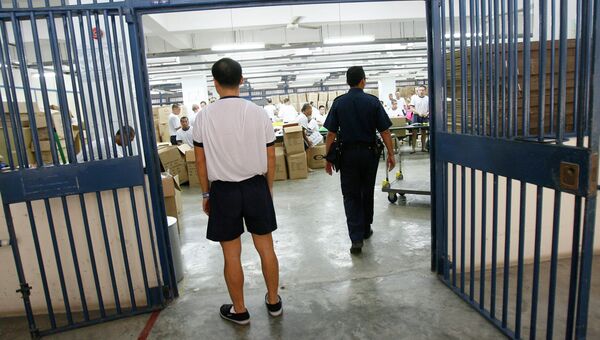 Заключенные в тюрьме Сингапура. Архивное фото