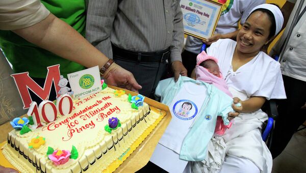 Родившаяся утром в воскресенье на Филиппинах девочка стала 100-миллионным жителем страны, 27 июля 2014