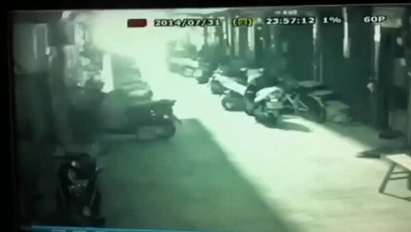 Момент одного из взрывов газа на Тайване. Съемка камеры наблюдения