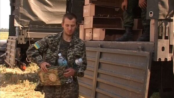 Украинский военнослужащий в палаточном лагере в Ростовской области