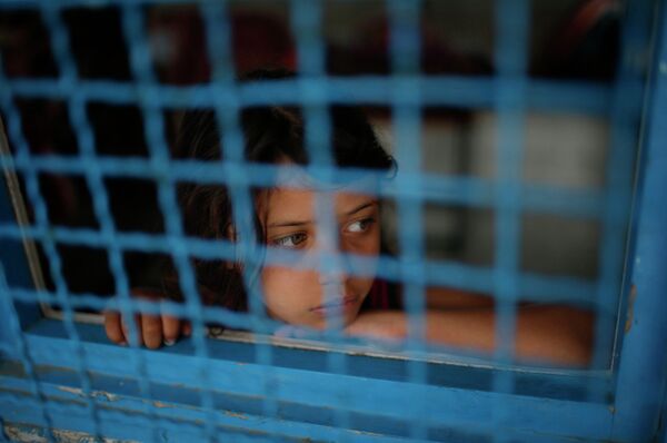 Палестинская девочка в лагере беженцев на севере сектора Газа
