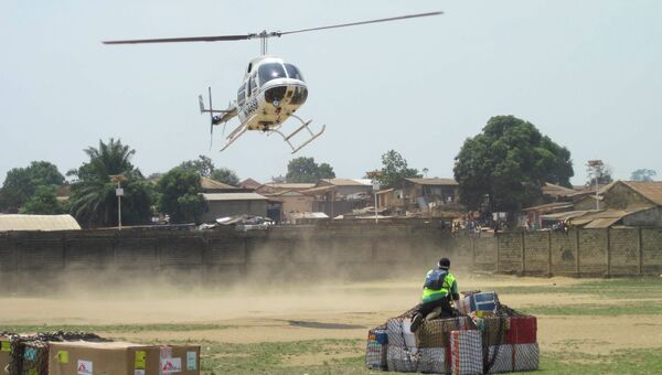 Доставка гуманитарной помощи во время эпидемии вируса Эболы в Либерию