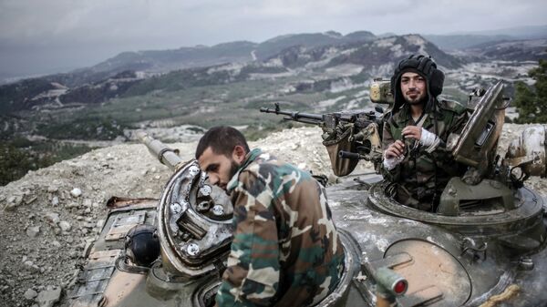 Танкисты правительственных войск сирийской армии. Архивное фото