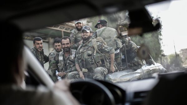 Солдаты в пикапе в сирийском городе Гута. Архивное фото