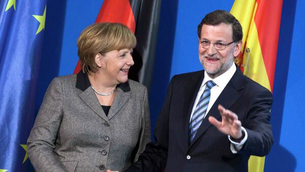 Канцлер Германии Ангела Меркель и премьер-министр Испании Мариано Рахой. Архивное фото