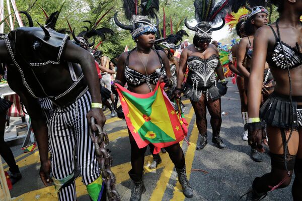 Участники West Indian Day Parade в Нью-Йорке, США