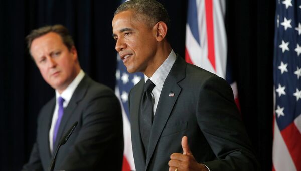 Президент США Барак Обама и премьер-министр Великобритании Дэвид Кэмерон участие в пресс-конференции. Архивное фото