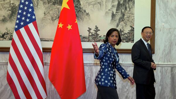 Советник администрации президента Обамы по национальной безопасности Сьюзан Райс и министр иностранных дел Китая Янг Джиечи во время встречи в Пекине