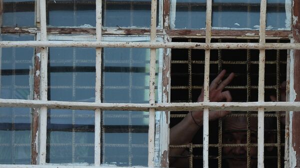 Заключенный в тюрьме, архивное фото