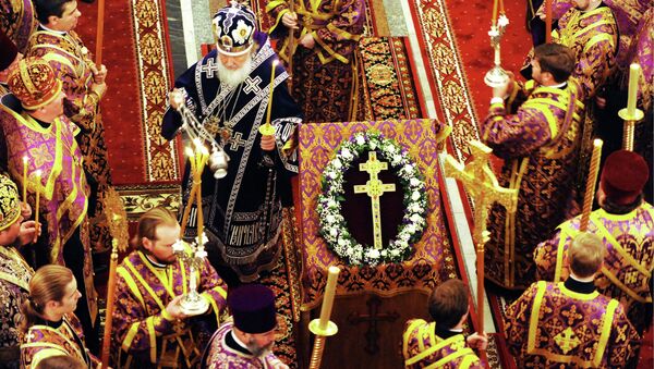 Патриарх Кирилл во время службы в праздник Воздвижения Креста Господня. Архивное фото