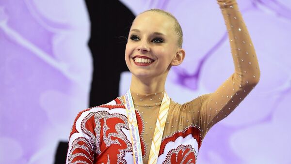 Яна Кудрявцева, завоевавшая золотую медаль в индивидуальном многоборье в финальном этапе чечемпионата мира по художественной гимнастике в Измире. Архивное фото