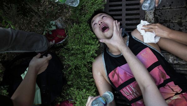 Раненый в результате столкновений полиции и протестующих в Гонконге