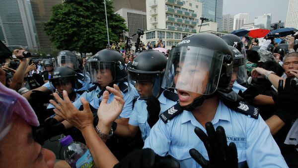 Полиция во время митинга в Гонконге. Архивное фото