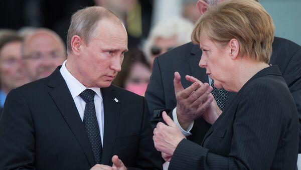 Президент России Владимир Путин и канцлер ФРГ Ангела Меркель. Архивное фото