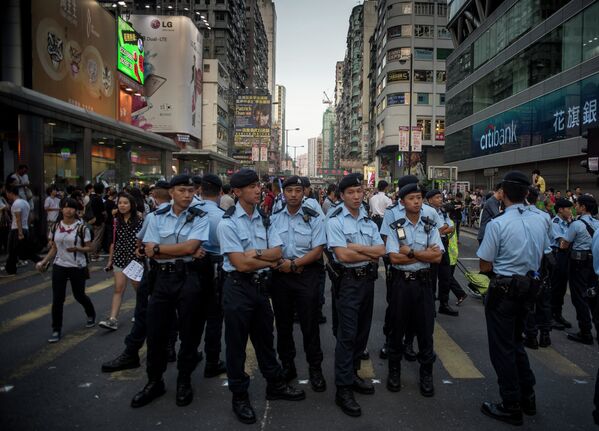 Полиция на митинге протестного движения Occupy Central в районе Mong Kok в Гонконге
