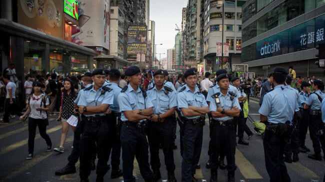 Полиция на митинге протестного движения Occupy Central в районе Mong Kok в Гонконге. Архивное фото