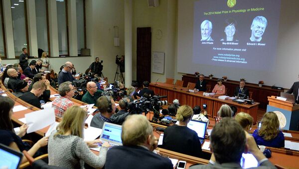 Профессор Оле Кин представляет победителей Нобелевской премии в области медицины. Каролинский институт в Стокгольме. 6 октября 2014