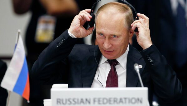 Президент РФ Владимир Путин на заседании саммита форума Азия-Европа 17 октября 2014