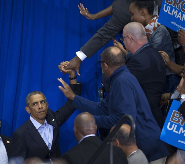 Президент США Барак Обама выступает в рамках своей кампании. Штат Мэриленд, 19 октября 2014