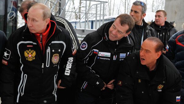 Экс-премьер-министр Италии Сильвио Берлускони (справа) во время частного визита в Россию