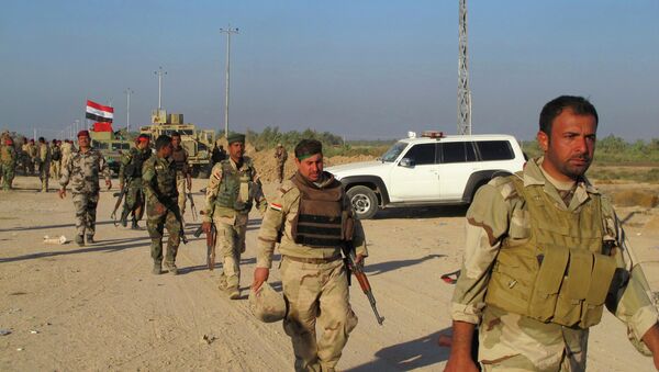 Иракские военные в городе Джурф ас-Сахр, к югу от Багдада 26 октября 2014
