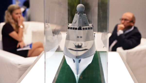Стенд компании ОСК (объединенная судостроительная корпорация) на 24-й Международной выставке военно-морской техники и вооружения Euronaval 2014. Архивное фото